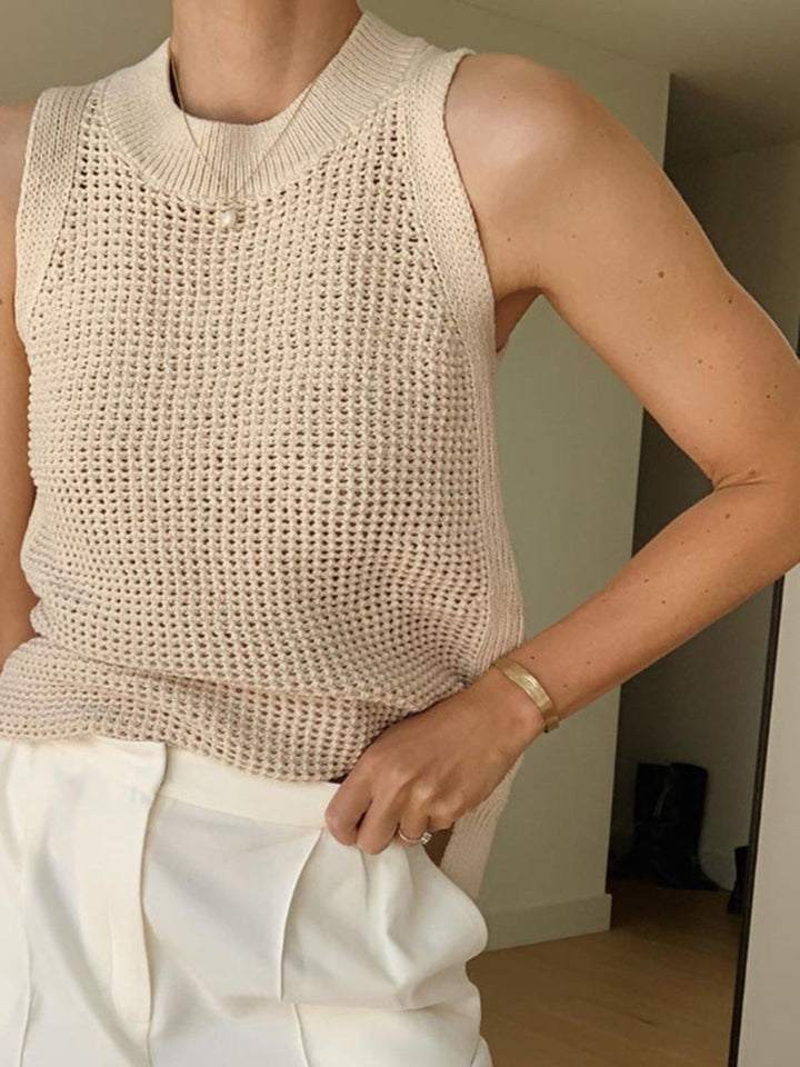 Soft knit women's sleeveless tank top with chic cut-out, comfortable for everyday wear & summer fashion.