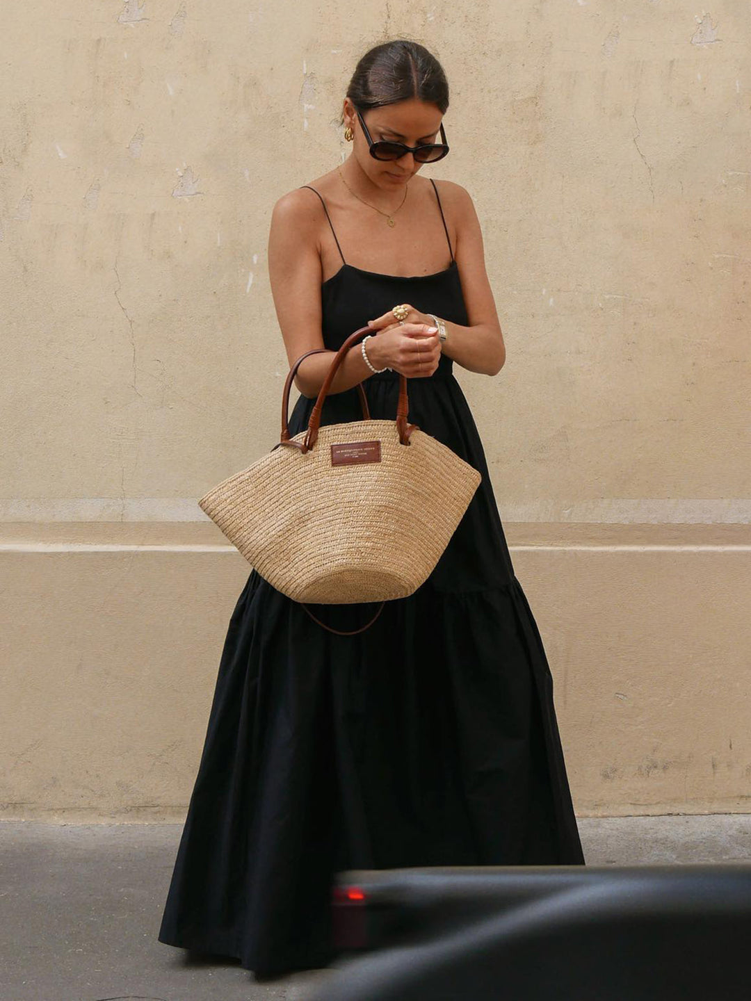 Women's elegant backless maxi dress, a perfect low-cut, flowy choice for summer events.