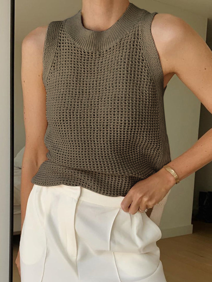 Versatile women's crew neck knit tank top, sleeveless with stylish cut-out design, ideal for summer.
