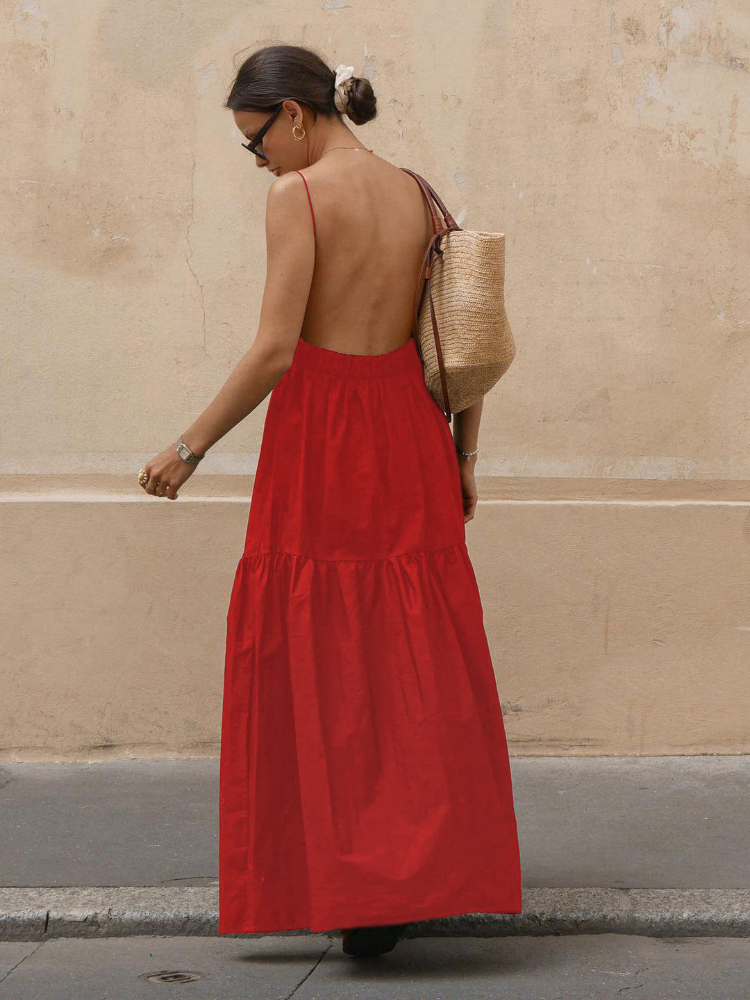 Women's elegant low-cut backless maxi dress, perfect for warm weather & parties.