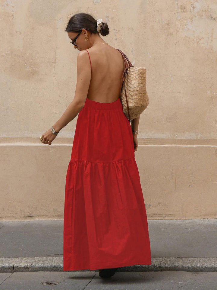 Women's elegant low-cut backless maxi dress, perfect for warm weather & parties.