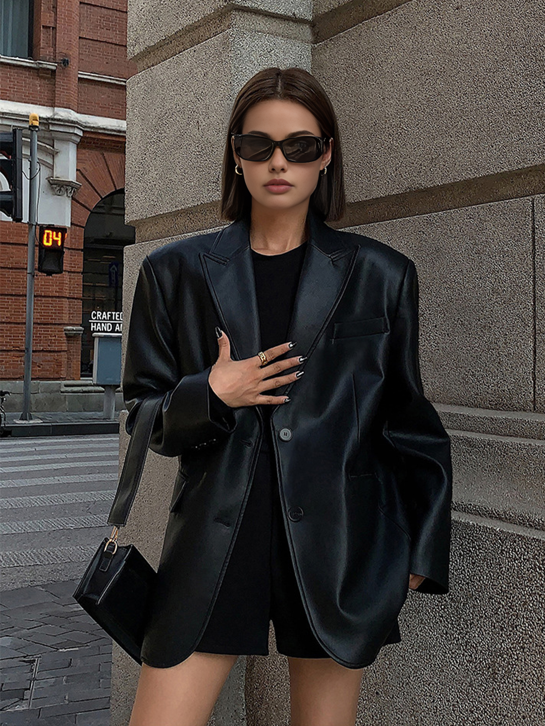 Women's oversized blazer, a confident style layering piece with a sharp lapel collar. Ideal versatile outerwear.