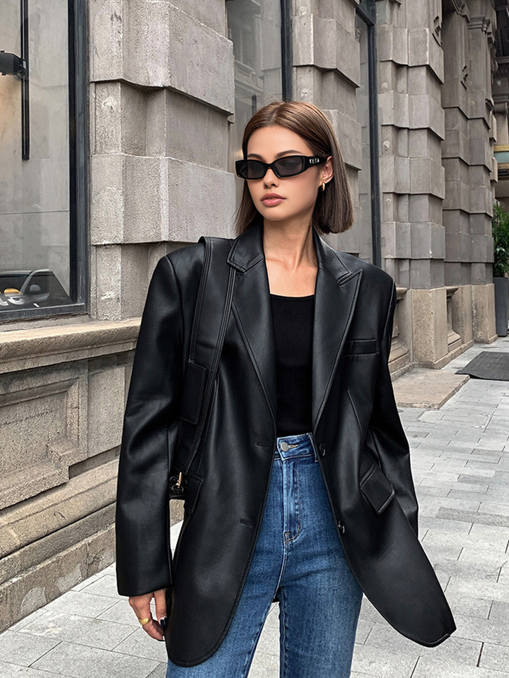Fashionable oversized women's blazer, a sophisticated statement jacket with a distinct lapel collar.