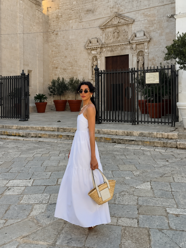Flowing women's maxi dress with an elegant backless design, ideal for summer & vacation.