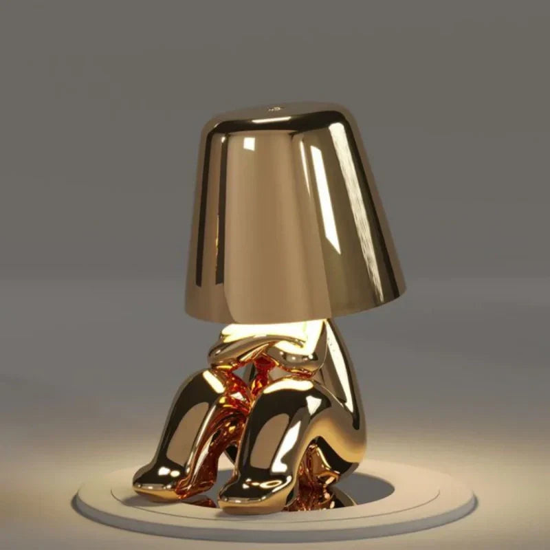 Resin figurine LED lamp, USB rechargeable. Portable and dimmable accent lighting for any space.