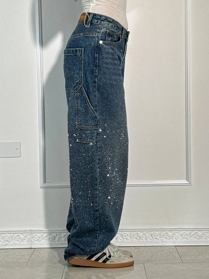 Glamorous women's shiny balloon leg carpenter jeans, offering a relaxed fit and sparkling finish.