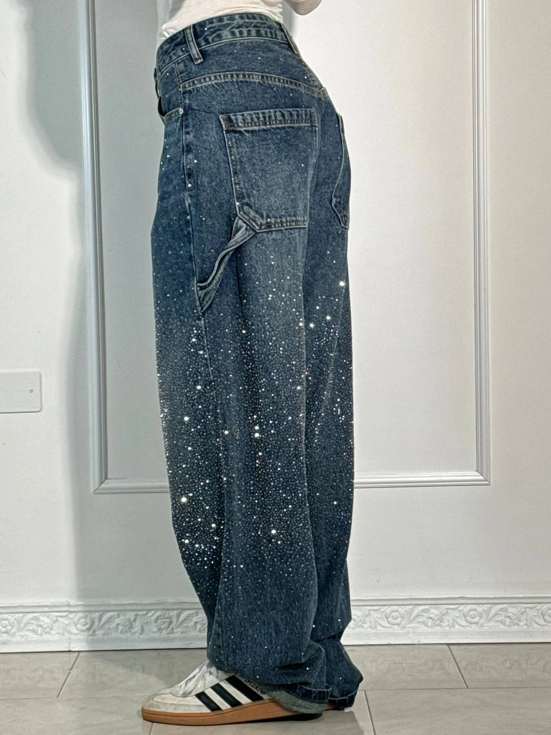 Trendy women's sparkling carpenter jeans with a unique balloon leg style and comfortable relaxed fit.