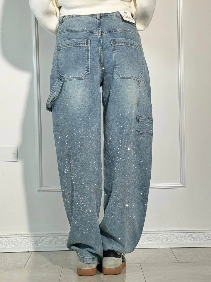 Women's statement sparkling balloon carpenter jeans, combining a relaxed fit with glamorous style.