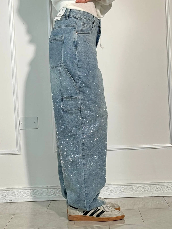 Shimmering women's balloon carpenter jeans, ideal for a glamorous look with a comfortable, relaxed fit.