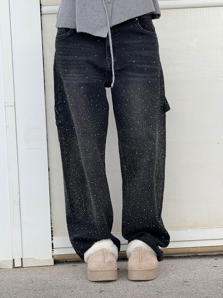 Fashion-forward women's sparkling balloon leg carpenter jeans, a shiny and trendy bottom option.
