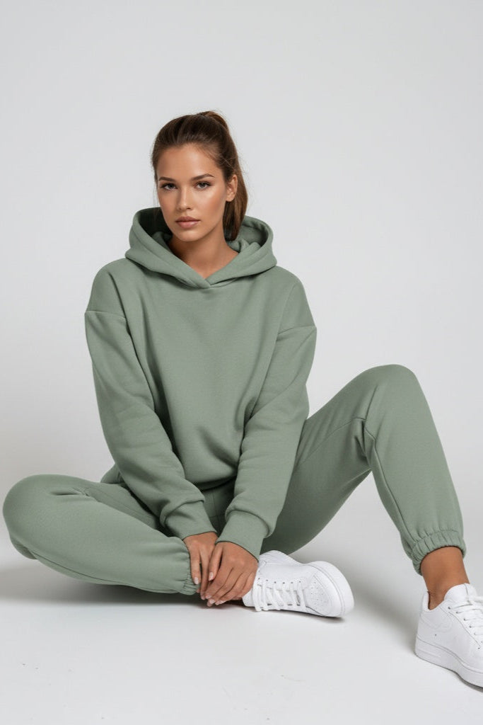 Women's casual athleisure jogging set. Hooded sweatshirt and joggers for a stylish, relaxed active look.