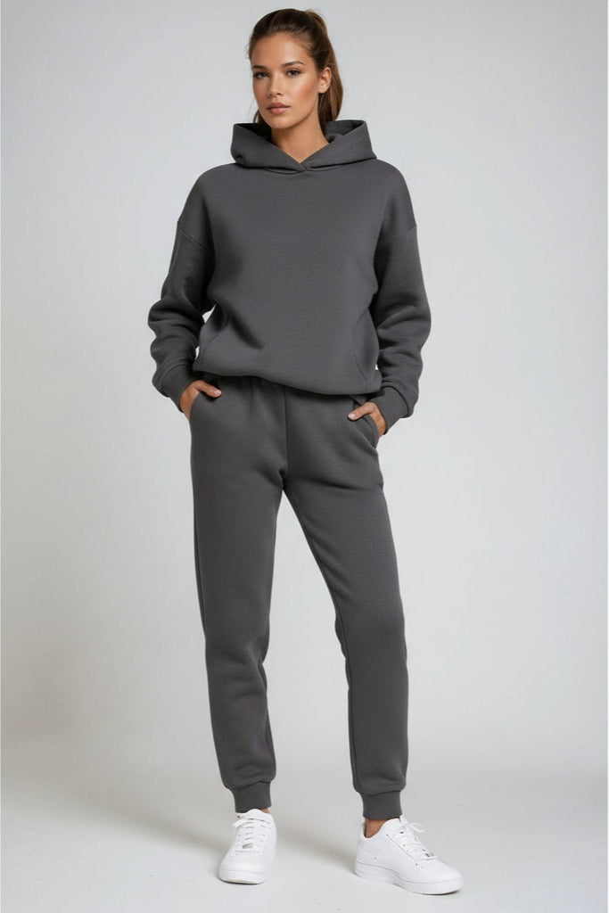 Plush women's hooded loungewear set. Soft sweatshirt and matching joggers ensure ultimate cozy comfort.
