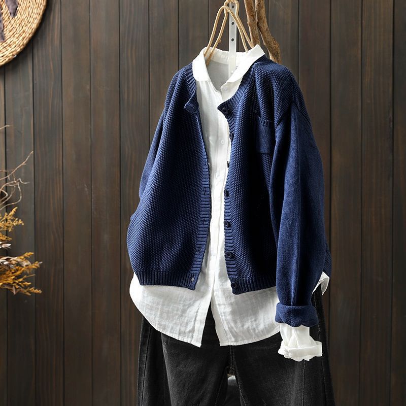 Warm women's knit cardigan with cozy texture & functional pockets. Essential layering for fall & winter outfits.