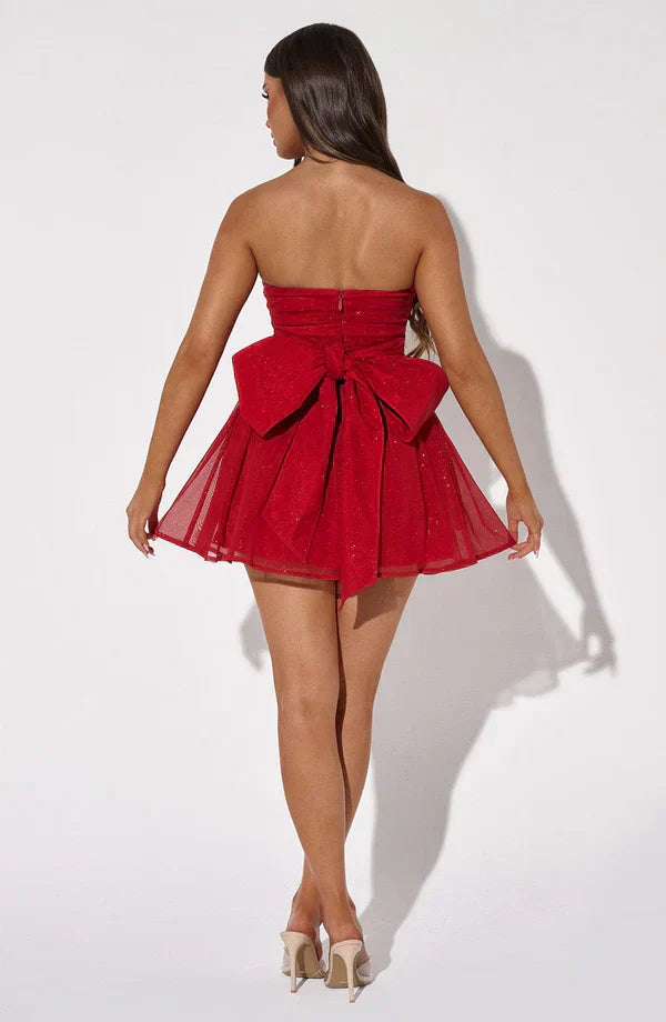 Dazzling women's glitter homecoming dress, a stylish short formal party dress featuring a charming bow detail.