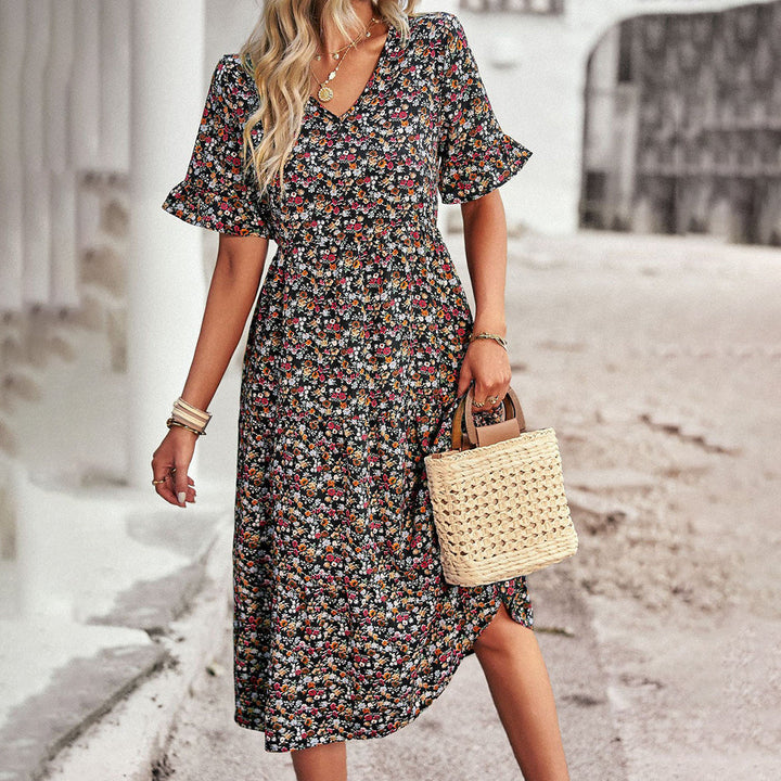 Chic bohemian floral midi dress with flowy summer style, perfect for casual wear, vacation, or seasonal outfits.