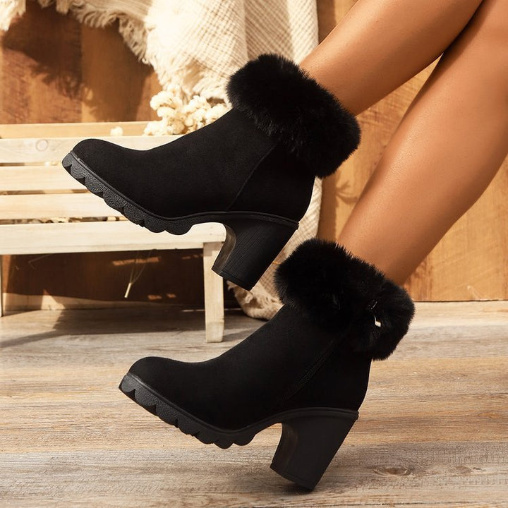 Cozy women's ankle boots featuring a plush collar & comfortable block heel for everyday wear.