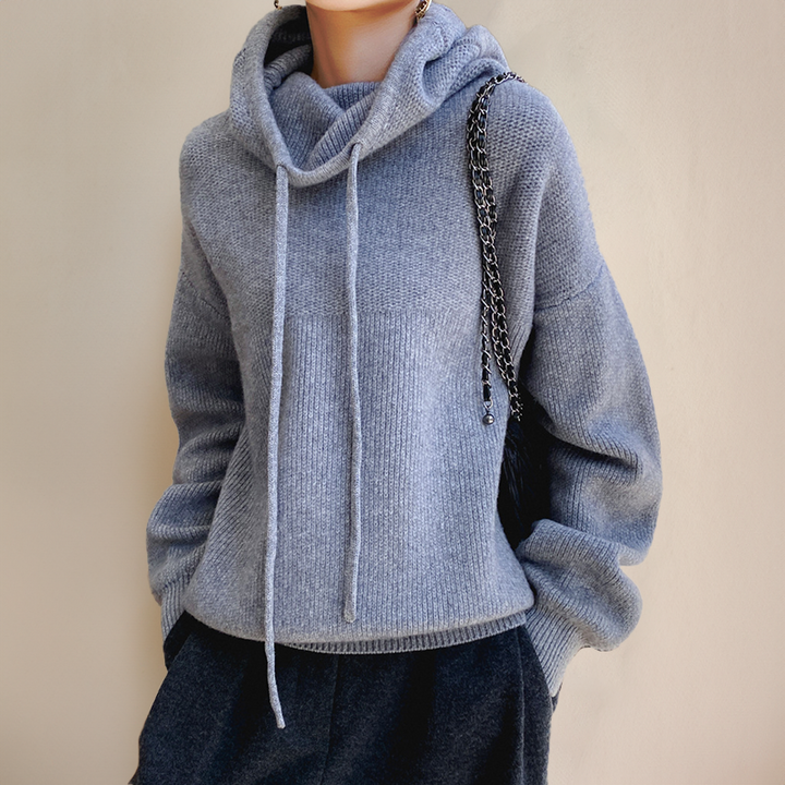 Woman wearing a stylish cowl neck hoodie, demonstrating its everyday comfort & casual wear versatility.