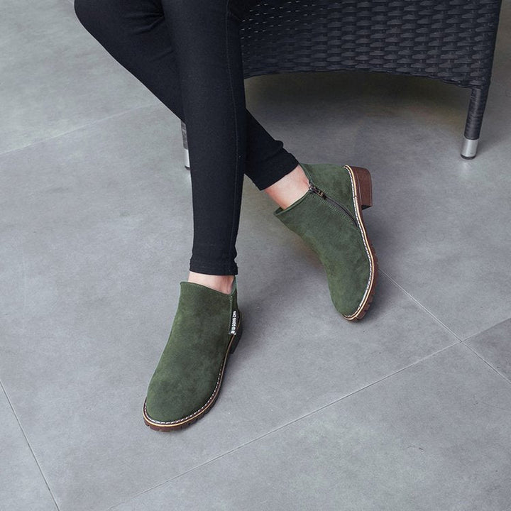 Chic women's block heel ankle boots, perfect for modern everyday & dress wear.