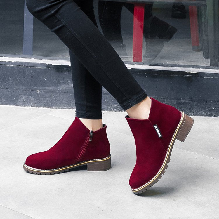 Comfortable women's block heel ankle boots, offering modern style for versatile wear.