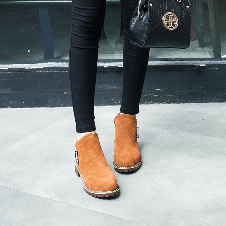 Stylish women's block heel ankle boots, ideal for fall & winter fashion footwear.