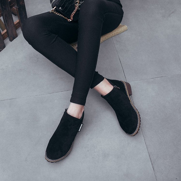 Versatile women's block heel ankle boots, a modern choice for any occasion.