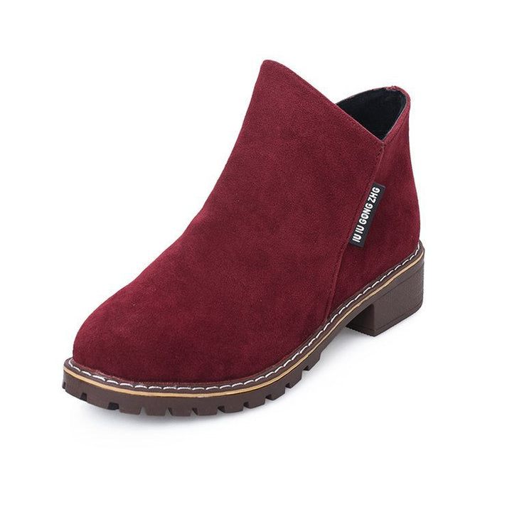 Elegant women's block heel ankle boots, a must-have for modern fall & winter footwear.
