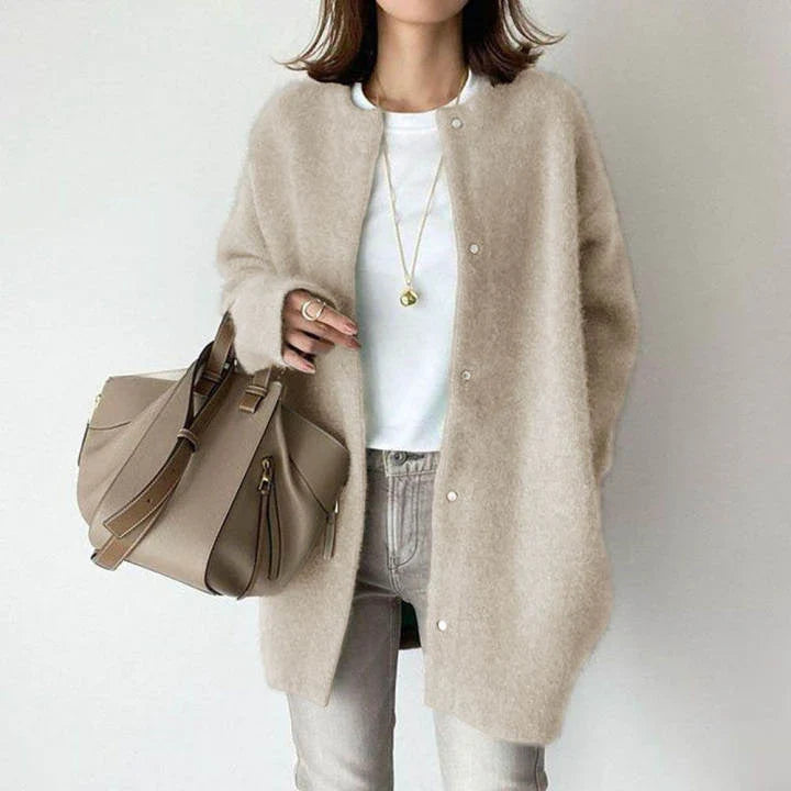 Women's versatile mid-length button cardigan for elegant everyday layering.