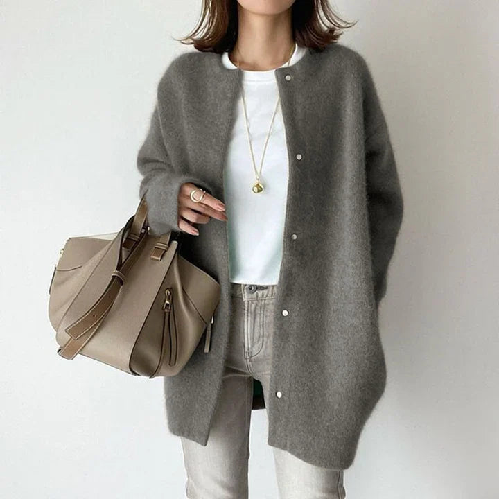 Women's chic mid-length button-front cardigan, perfect for comfortable, versatile layering.