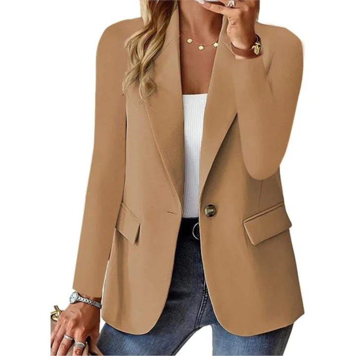 Back view of a women's relaxed fit open front blazer, showing its smooth tailored back for a polished versatile look.