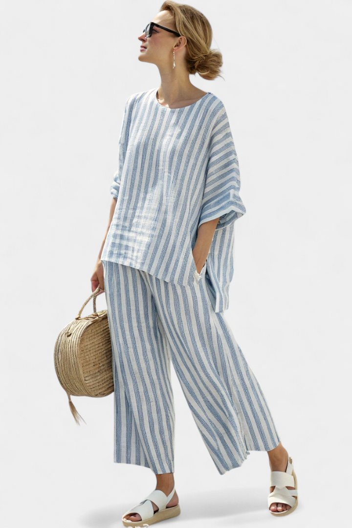 Women's blue striped relaxed fit two-piece top & pants set. Perfect for casual summer wear and comfortable everyday style.