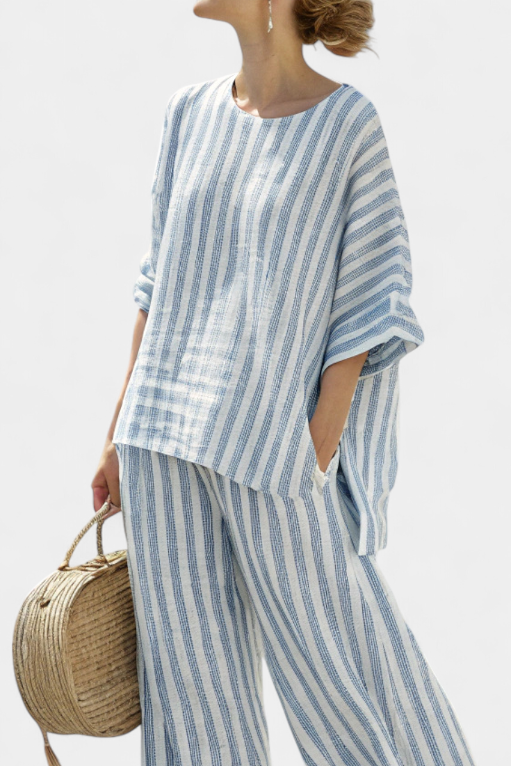 Stylish women's blue striped relaxed top & pants set. Ideal for summer, casual outings, or a comfortable vacation outfit.