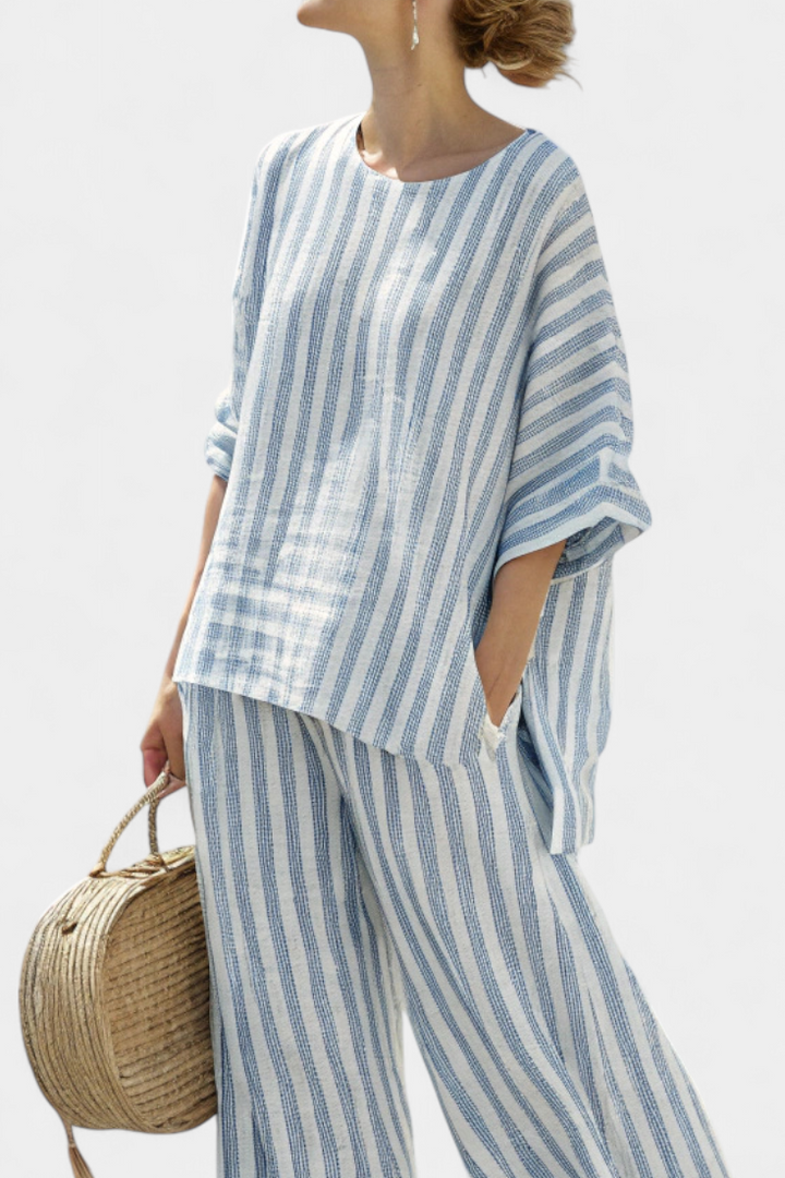 Stylish women's blue striped relaxed top & pants set. Ideal for summer, casual outings, or a comfortable vacation outfit.