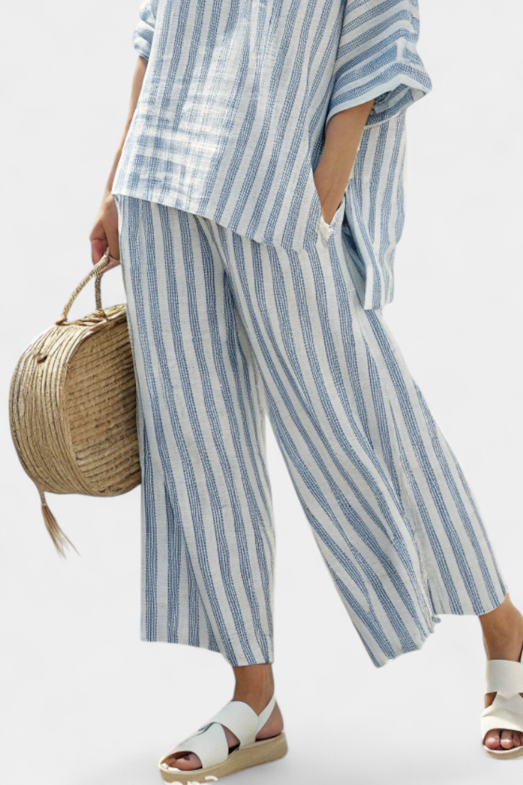 Coastal style women's blue striped two-piece set. Relaxed fit top and pants for easy, comfortable summer fashion.