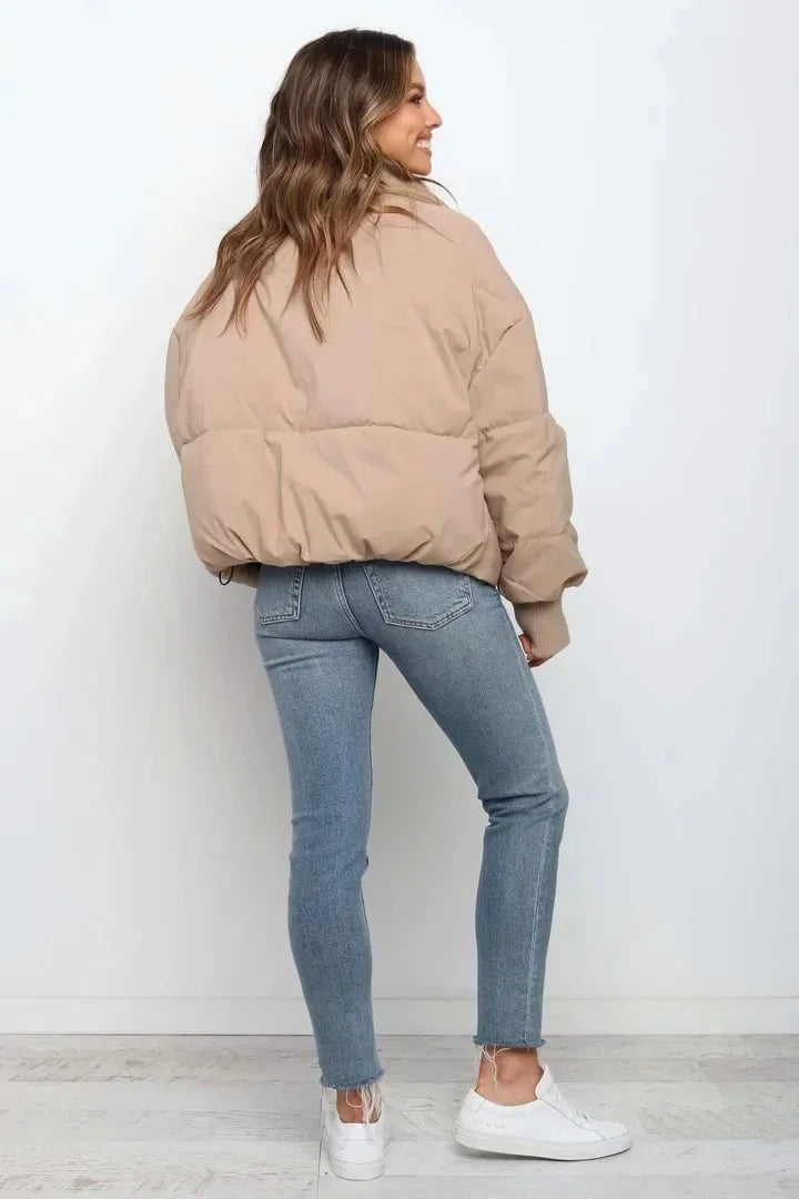Cozy women's quilted puffer coat, modern design for everyday winter fashion.