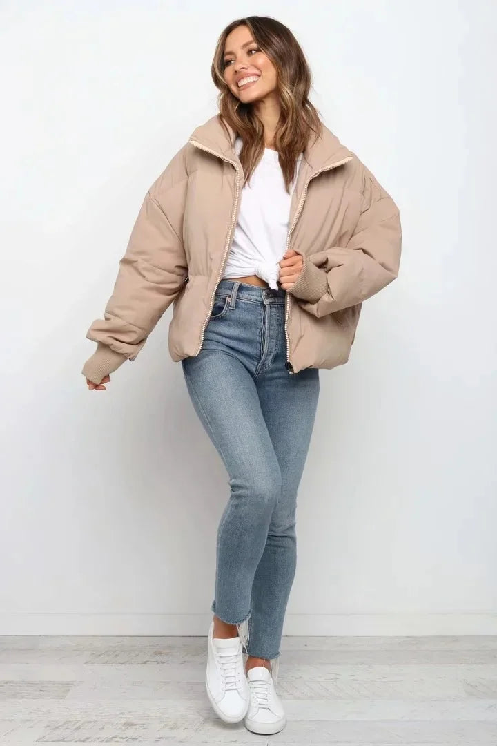 Fashionable women's quilted puffer coat, offering warmth and winter style.