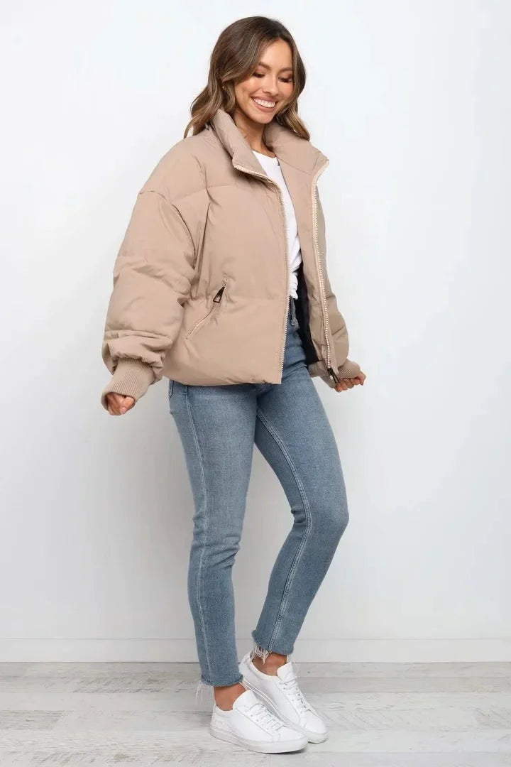 Elegant women's quilted puffer jacket, a chic choice for winter outerwear.