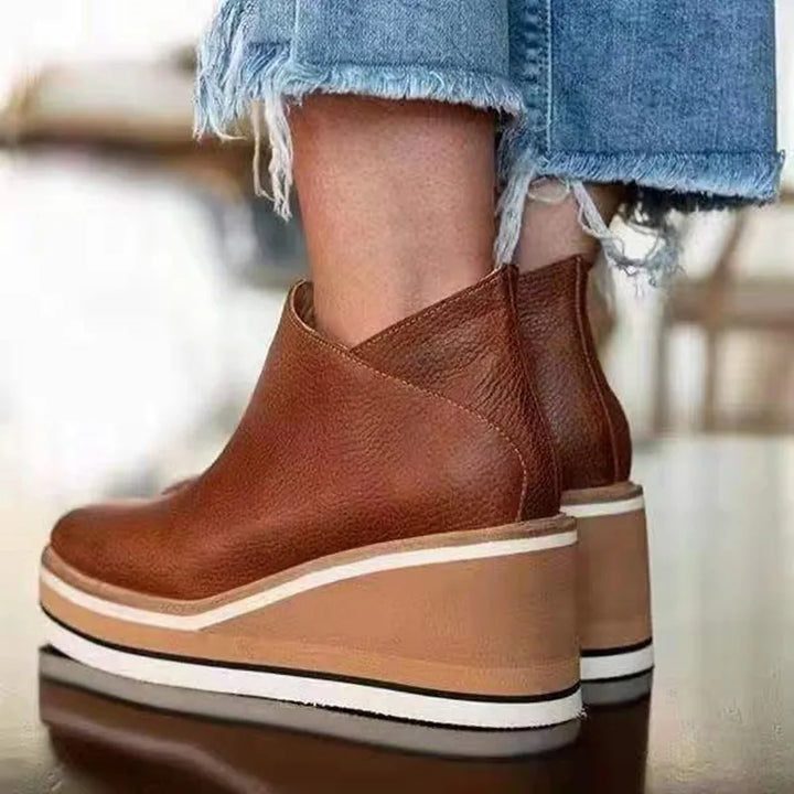 Elevate your look with women's comfortable platform ankle boots, supportive and fashion-forward.