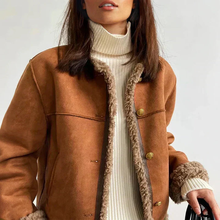 Luxury women's elegant winter coat, insulated for warmth, ideal for sophisticated daily wear in cold weather.