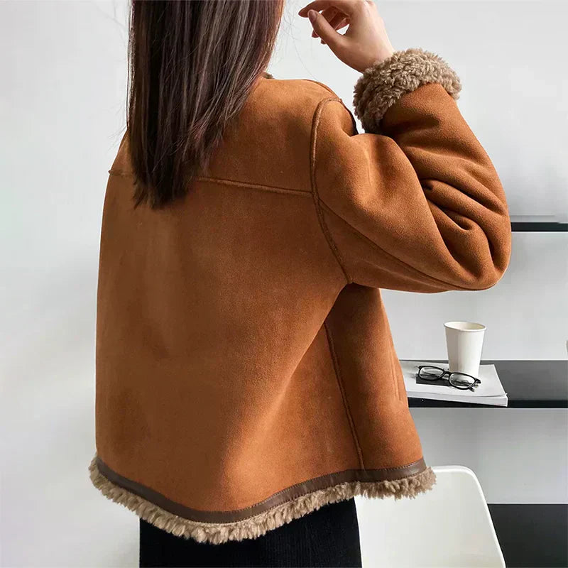 Cozy and stylish women's insulated winter jacket, designed for ultimate warmth and elegant fashion.