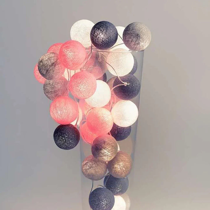Soft pastel cotton ball LED lights, gentle ambient lighting for nurseries or calm spaces.