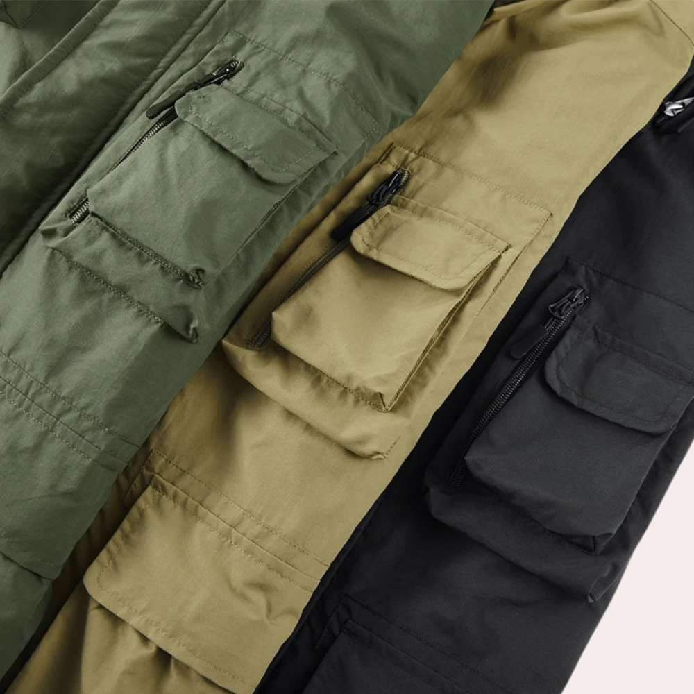 Outdoor men's warm winter parka. Waterproof, padded, regular fit jacket with hood for extreme cold.