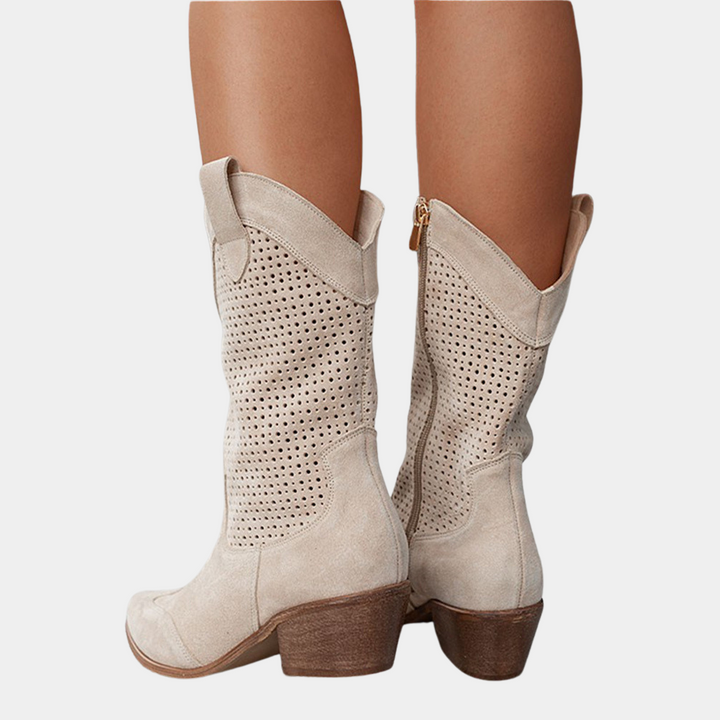 Western-style women's boots, designed with orthopedic features for foot health and lasting comfort.