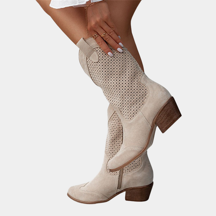Comfortable women's western boots with arch support, providing orthopedic relief and classic cowboy style.