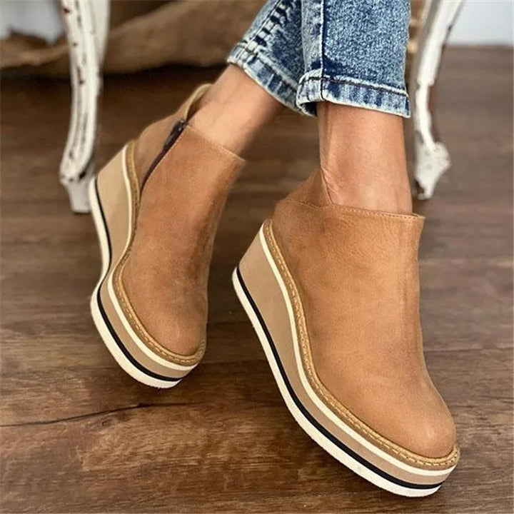 Women's comfort platform ankle boots with supportive mid heel, perfect for everyday autumn & winter style.