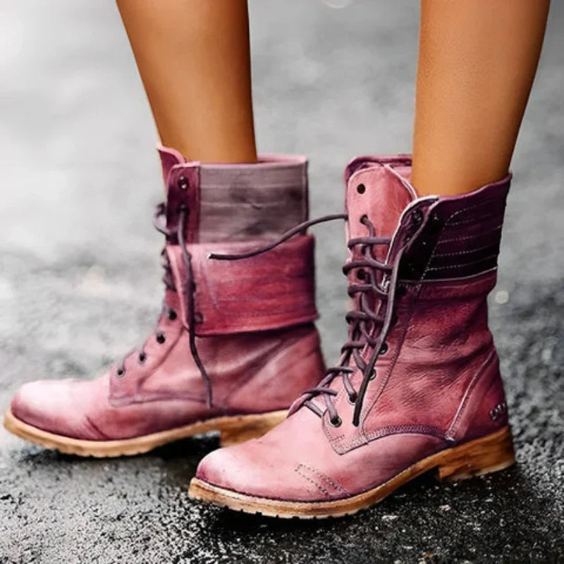 Stylish women's black lace-up combat boots. Rugged ankle boots, perfect for fall and winter fashion footwear.