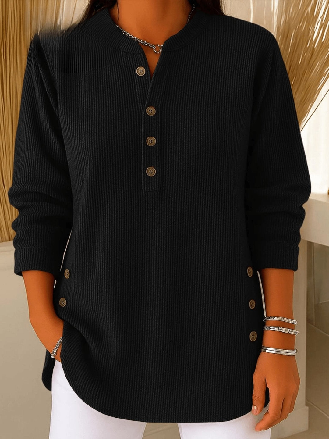 Modern women's ribbed longline tunic with a classic Henley button front.