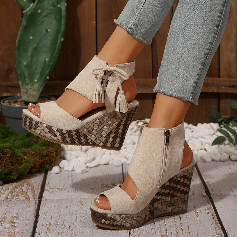 Fashionable women's high wedge sandals with intricate tassel detail, ideal for casual wear.