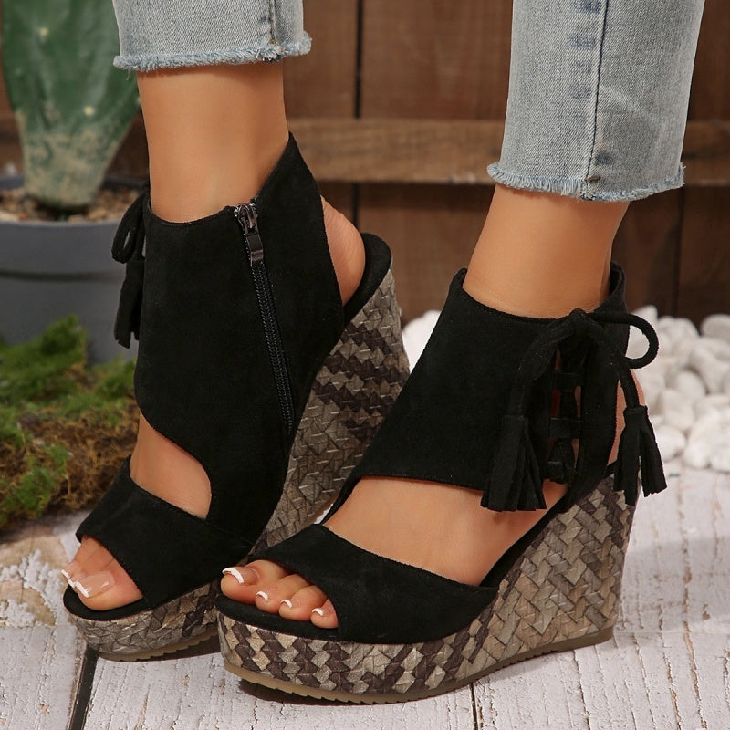 Boho chic slip-on wedge sandals for women, designed with eye-catching tassel embellishments.