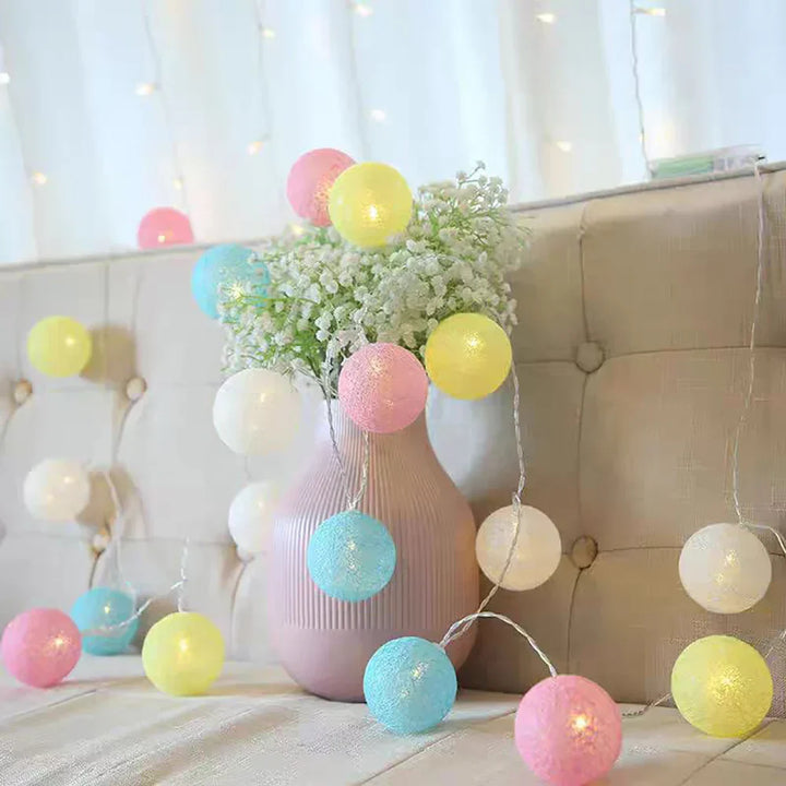 Cotton ball fairy lights for cozy reading nooks, adding warm, inviting illumination.