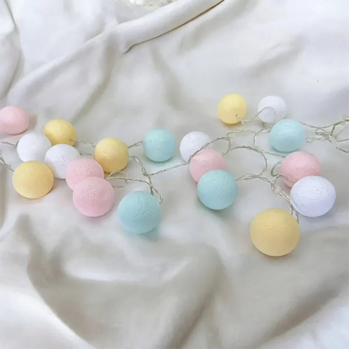 Cotton ball string lights with remote control, easy adjustment for perfect mood lighting.